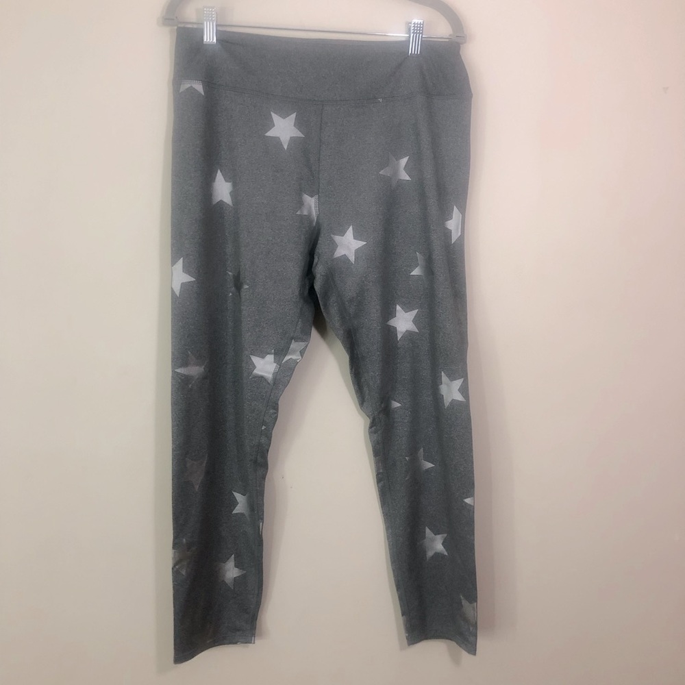 Fun grey Xersion workout pants with shiny silver stars